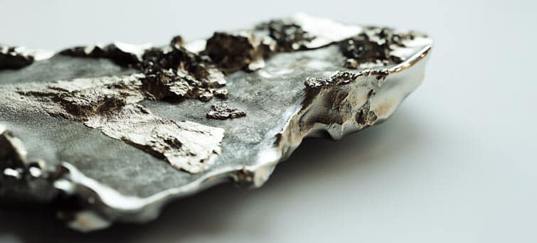 a piece of metal that is sitting on a table