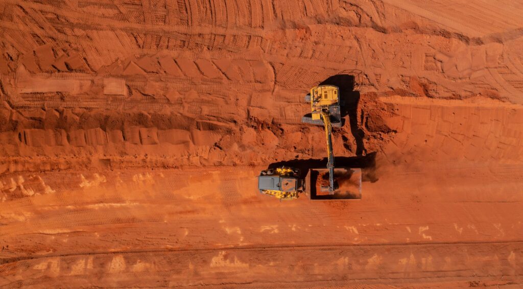 truck is parked in the middle of the desert