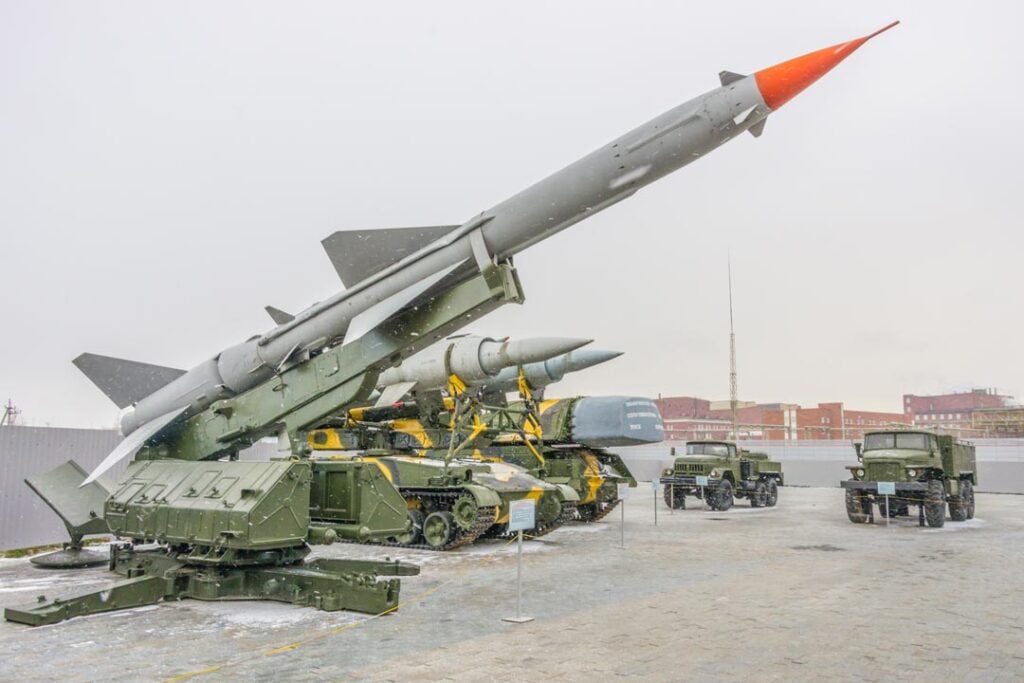 group of military vehicles parked next to each other
