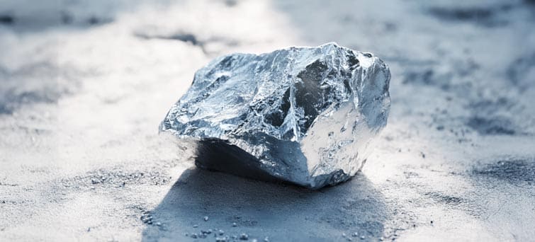 The Samarium appears as a hard, silvery-white metal with a smooth yet slightly rugged surface, showcasing its stability in air.