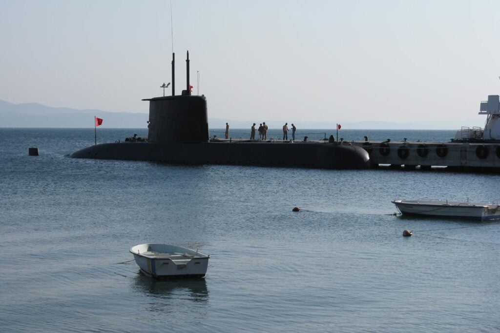submarine and a boat in the water