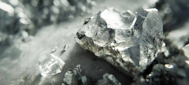 The Scandium has a soft, silvery-white appearance with hints of a yellowish or pinkish cast from oxidation.